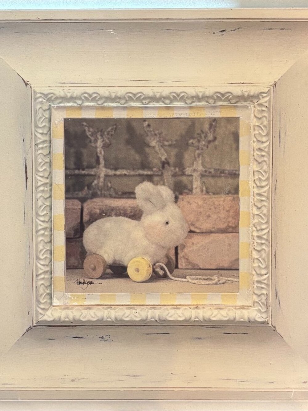 Vintage Stuffed Bunny on wheels print by Rhonda Jesson. Cream/off-white on wood